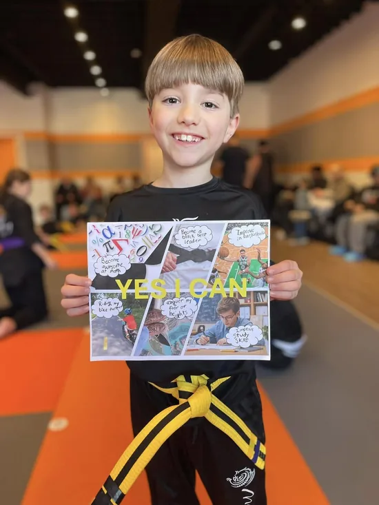 Kids Martial Arts Troy MI | 33 Years Building Confident Leaders 2 Young boy in karate class in Troy MI.