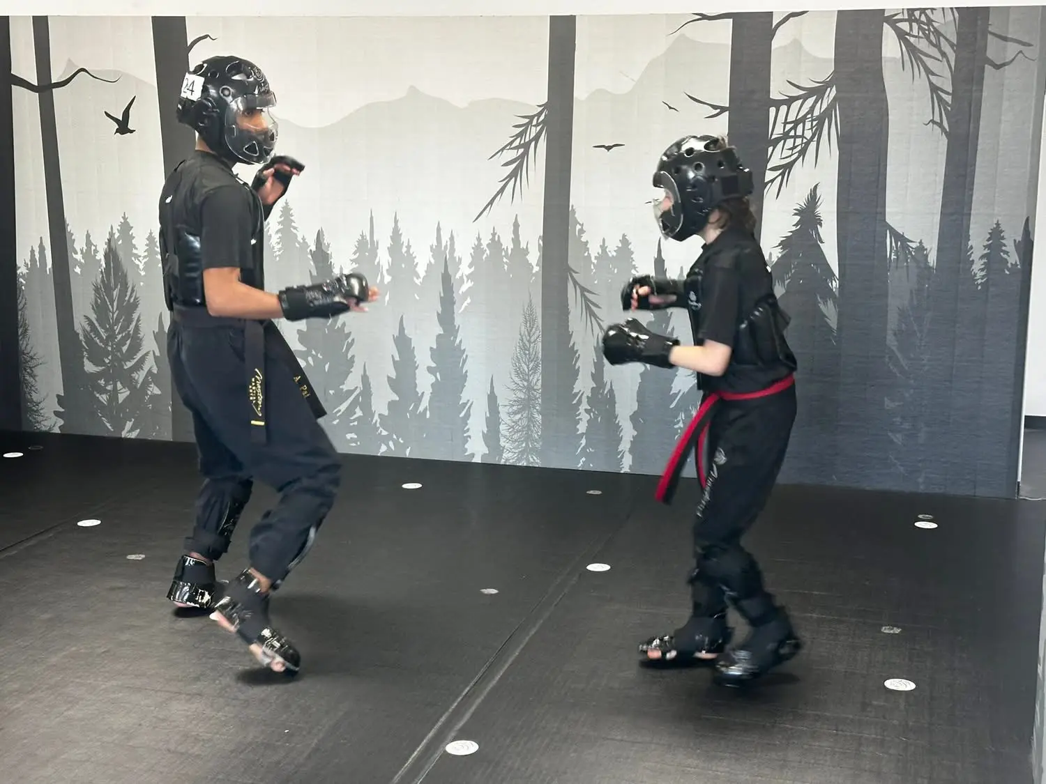Black Belt Story – Avi Braun 4 Avi Braun sparring with focus and intensity in ring at Mastery Martial Arts