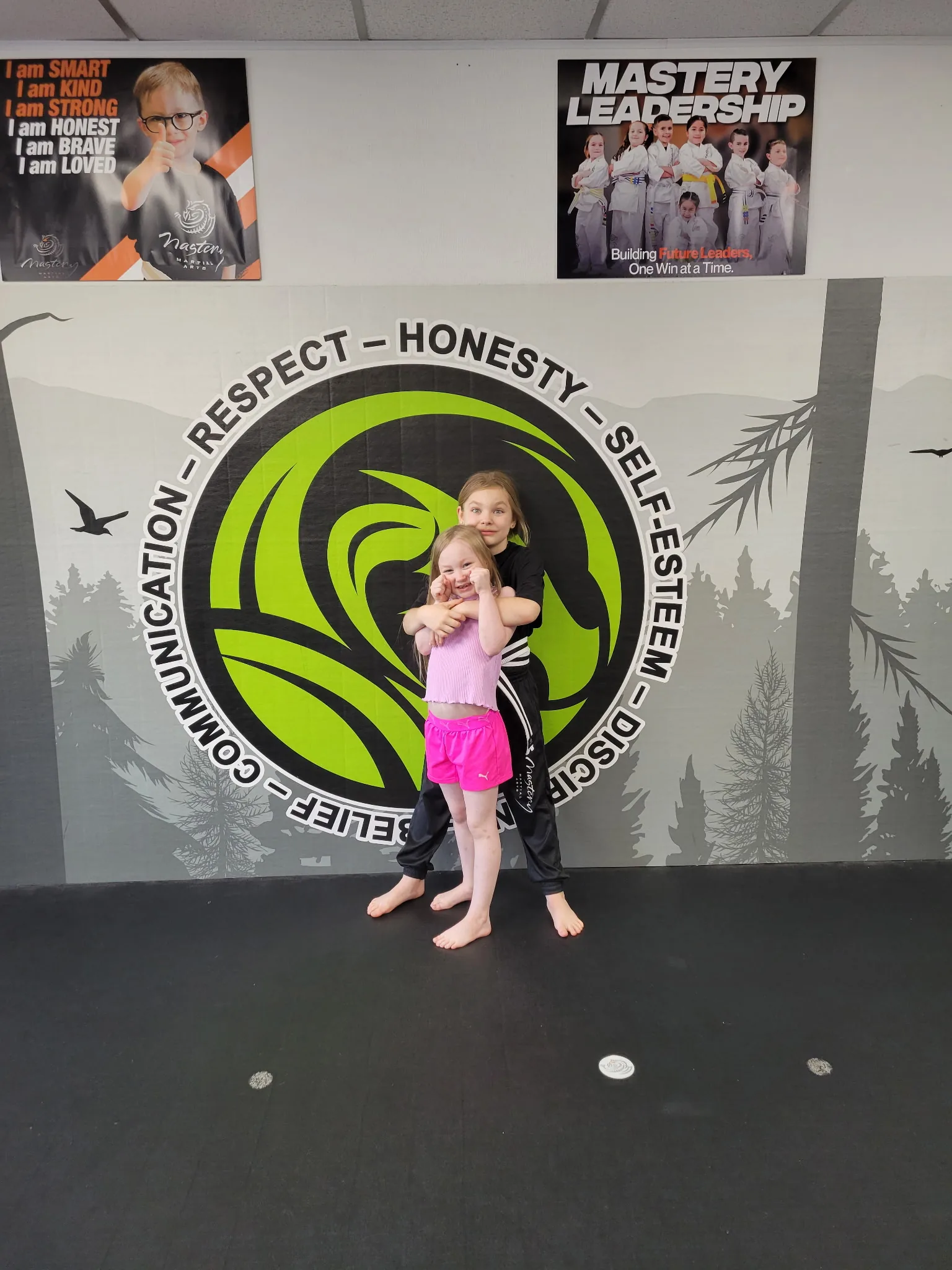 Building confidence at Mastery Martial Arts Troy MI - Violet with her best friend